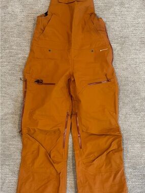Flylow Snow Bibs | Size M | Rust Orange